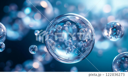 Series of bubbles floating in the air, each one reflecting the light and creating a sense of movement and energy 122836273