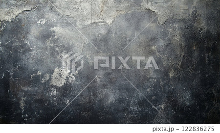 Wall with a lot of cracks and holes. The wall is gray and black. The wall is old and worn 122836275