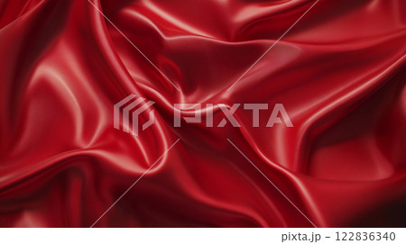 Red fabric with a shiny texture. It is a piece of cloth that is red in color 122836340