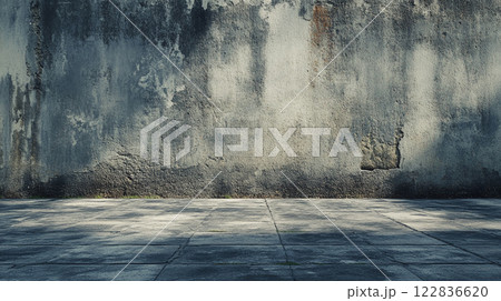 Wall with a large crack in it. The crack is very wide and extends from the top of the wall to the bottom. The wall is made of concrete and has a rough texture Wall with a large crack in it. The crack is very wide and extends from the top of the wall to the bottom. The wall is made of concrete and has a rough texture 122836620