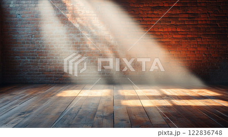 Brick wall with sunlight shining through the window. The room is empty and the light is coming in from the window 122836748
