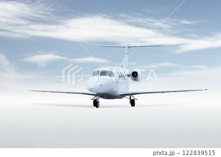 Modern white corporate airplane isolated on bright background with sky 122839515