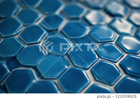 Beautiful hexagonal blue tiles arranged in a pattern, perfect for home decor or renovation projects 122839928