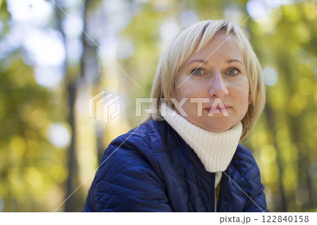 Portrait of a middle aged woman in a street Portrait of a middle aged woman in a street 122840158