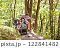 Father with children in all terrain stroller 122841482