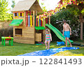 Kids playing in swimming pool 122841493