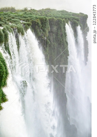 Iguazu waterfalls in overcast weather Iguazu waterfalls in overcast weather 122843773