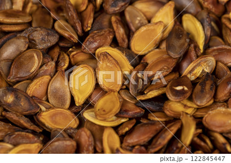 ripe pumpkin seeds fried to brown and golden 122845447