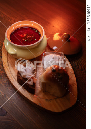 Restaurant dish borscht, delicious bread with 122846419