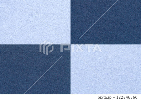 Texture craft navy blue and denim paper background with cells pattern, macro. Structure vintage kraft sky cardboard. Texture craft navy blue and denim paper background with cells pattern, macro. Structure vintage kraft sky cardboard. 122846560