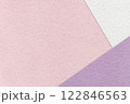 Texture of craft light pink color paper background with white and lilac border. Vintage abstract rose cardboard. 122846563