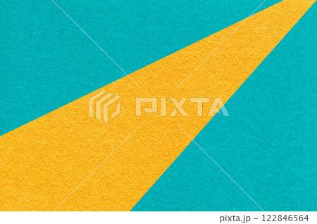 Texture old craft yellow and turquoise paper background, macro. Structure vintage abstract cerulean cardboard 122846564