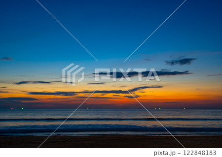 Landscape of colorful clouds in sunset or sunrise sky over sea with reflection in the tropical sea,Beautiful seascape scenery,Amazing light of nature Landscape nature background Landscape of colorful clouds in sunset or sunrise sky over sea with reflection in the tropical sea,Beautiful seascape scenery,Amazing light of nature Landscape nature background 122848183