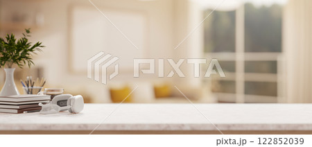 A white tabletop with a blurred background of a modern living room. A white tabletop with a blurred background of a modern living room. 122852039