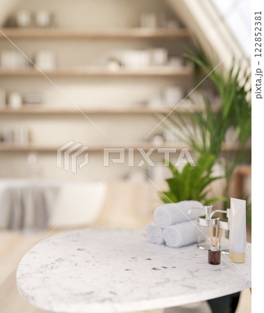 A round white-marble table with bath accessories items set in a beautiful Scandinavian bathroom. A round white-marble table with bath accessories items set in a beautiful Scandinavian bathroom. 122852381