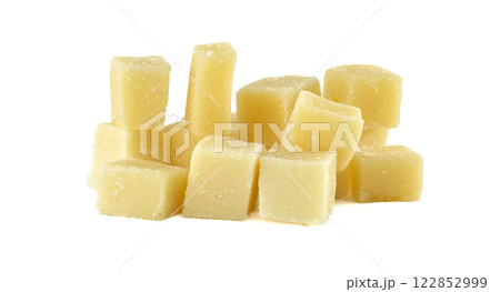 Parmesan cheese cubes forming a pile on white background 122852999