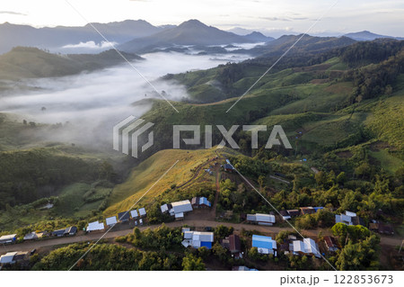 Landscape of Morning Mist with Mountain Layer at north of Thailand. mountain ridge and clouds in rural jungle bush forest Landscape of Morning Mist with Mountain Layer at north of Thailand. mountain ridge and clouds in rural jungle bush forest 122853673