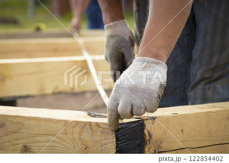 Measure the length of the construction of the house Measure the length of the construction of the house 122854402