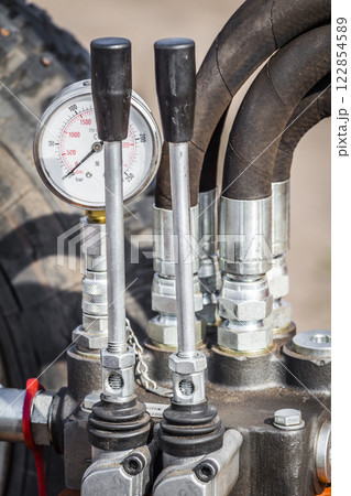 Control levers of the hydraulic machine Control levers of the hydraulic machine 122854589