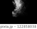 White cloud of powdery substance is floating in the air 122858038