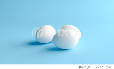 White eggs isolated on light blue background with space for text, lying horizontally. 122860798