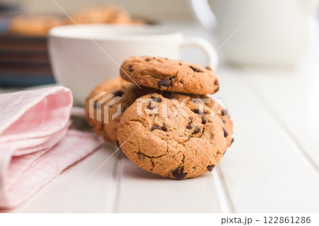 Chocolate chip cookies on white table. Chocolate chip cookies on white table. 122861286