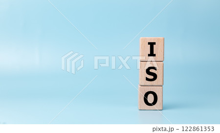 ISO, Standard certification standardisation quality control concept, Wooden blocks with the letters ISO for quality management of organizations on a light blue background, Certified and quality. 122861353
