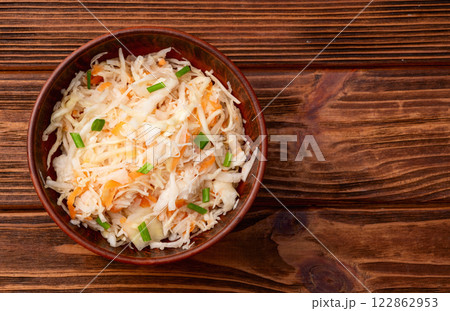 Tasty marinated cabbage with carrot, healthy food  Sauerkraut photography . Top view 122862953