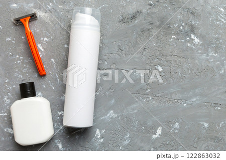 shaving man set. shaving machine, towel, lotion and shaving foam on colored background. Men bath Accessories top view shaving man set. shaving machine, towel, lotion and shaving foam on colored background. Men bath Accessories top view 122863032