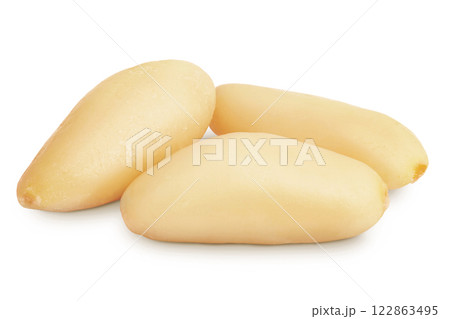 Shelled European pine nuts isolated on white background with full depth of field Shelled European pine nuts isolated on white background with full depth of field 122863495
