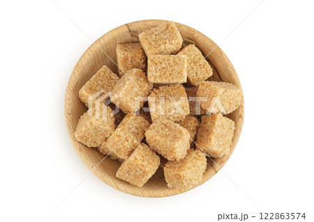 brown sugar in a wooden bowl isolated on white background. Top view. Flat lay 122863574