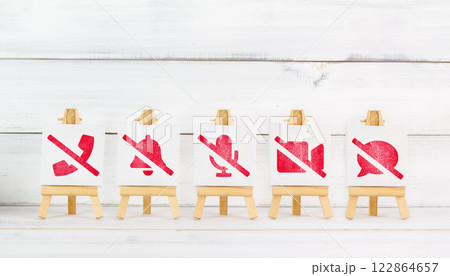 No Communication Symbols on Mini Easels Representing Silent Mode and Do Not Disturb No Communication Symbols on Mini Easels Representing Silent Mode and Do Not Disturb 122864657