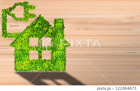 Green Home: Leafy House with Plug Symbolizing Eco-Friendly Living and Sustainable Energy Solutions 122864673