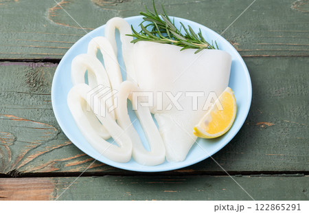 Squid tube and ring photography . Seafood top view 122865291