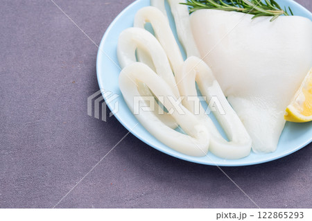 Squid tube and ring photography . Seafood top view 122865293