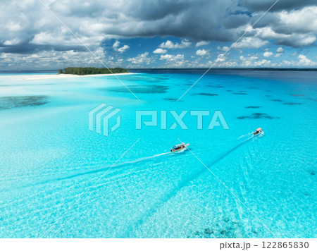 Aerial view of colorful boats in clear azure water in summer 122865830