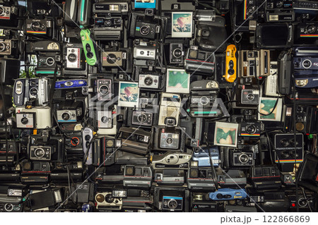 Many old polaroid vintage photography cameras on display Many old polaroid vintage photography cameras on display 122866869