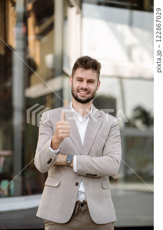 Portrait of a successful business man, confident, looking to camera. 122867029