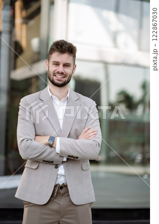 Portrait of a successful business man, confident, looking to camera. 122867030