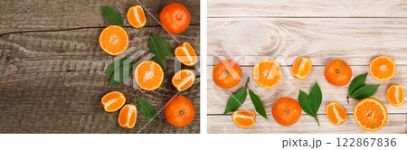 orange or tangerine with leaves on old wooden background. Flat lay, top view. Fruit composition 122867836