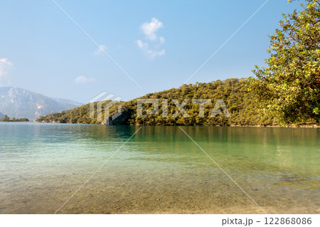 Calm Blue Lagoon on a Clear Summer Day - A Tropical Paradise for Relaxation 122868086