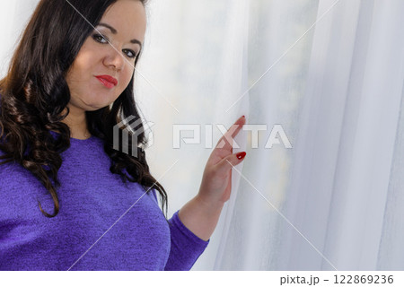 Plus size adult woman portrait Plus size adult woman portrait 122869236