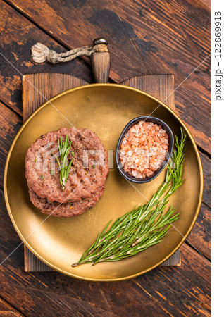 BBQ roasted hamburger chopped meat steaks patties with rosemary. wooden background. top view 122869913