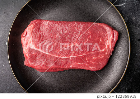 Fresh raw Rump beef steak, organic meat. black background. top view 122869919