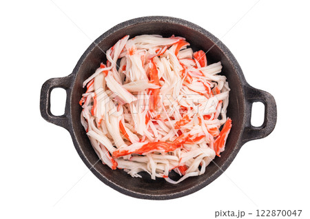 japanese Crab meat, crabmeat imitation in a skillet isolated on the white background. top view japanese Crab meat, crabmeat imitation in a skillet isolated on the white background. top view 122870047