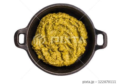 Basil Pesto sauce, Iitalian sauce in a skillet isolated on white background Basil Pesto sauce, Iitalian sauce in a skillet isolated on white background 122870111