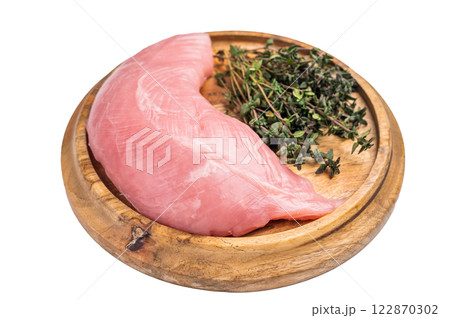 Fresh turkey breast fillet, raw poultry meat with herbs for cooking isolated on white background. top view 122870302