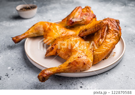 Roasted Spatchcock Chicken, poultry meat. grey background. top view 122870588