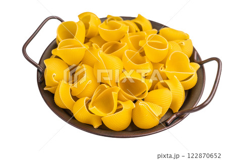 Jambo Pipe rigate raw pasta isolated on white background. top view 122870652