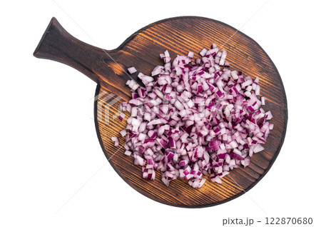 Chopped raw Red onion on wooden board isolated on a white background. top view Chopped raw Red onion on wooden board isolated on a white background. top view 122870680